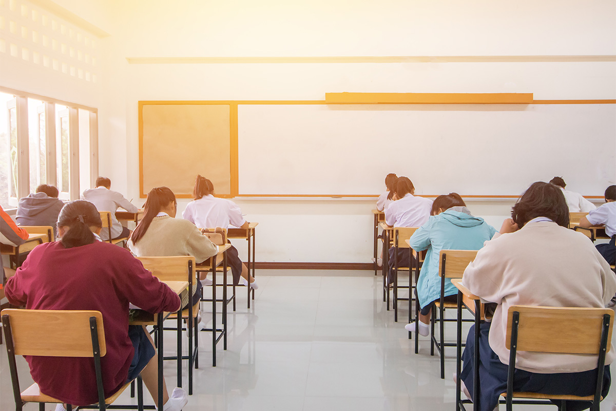 Class of teenagers sitting a listening exam - ELT and e-learning audio production